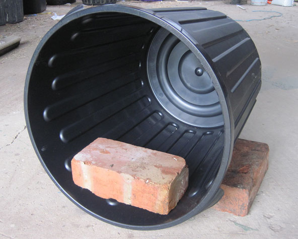 Large photo of plastic 60 litre rubbish bin nest box with bricks in position.