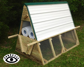 Photo of a small homemade A frame chicken tractor.