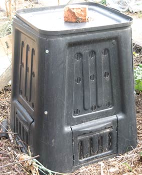 Photo of a plastic compost bin.