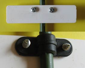 Photo of a plastic marker attached to a small rose stake.