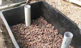 Photo of wicking tub with scoria stones added