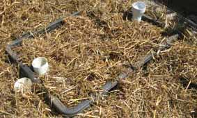 In ground wicking tub filled with soil.