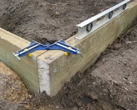 Photo of a clamped and screwed side of a wicking bed