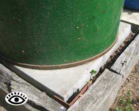 Photo of a 44 gallon open drum water tank base