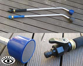 Photo of two Dramm wands with close ups of the head and shut off valve